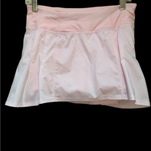 Lululemon skort Worn once. Color is peach not orange. Super cute for summer !